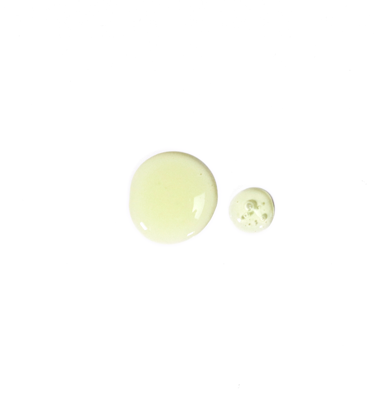 A smear of white cream against a plain background.